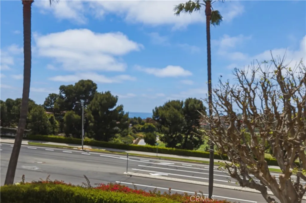 Ocean and Catalina Island view from main balcony overlooking golf course and golf cart path