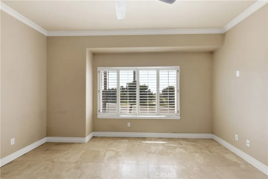 Primary bedroom with Ocean View / Catalina Island View and plantation shutters