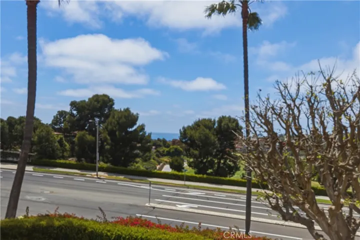 Ocean and Catalina Island view from main balcony overlooking golf course and golf cart path