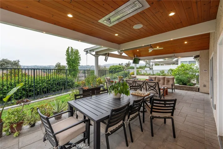 This custom patio is designed for year round living with its ceiling heaters and fan
