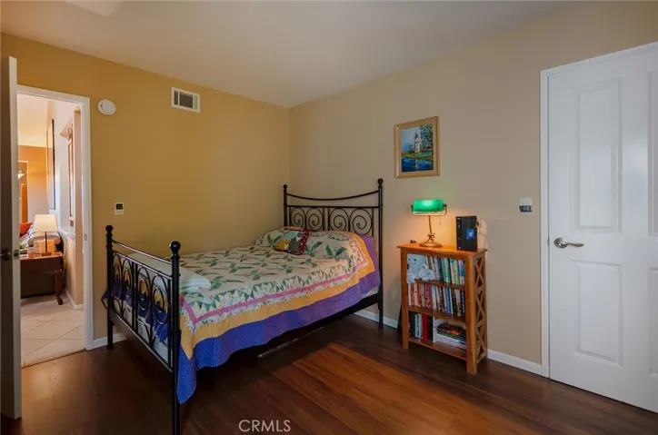 The second bedroom has 2 doors