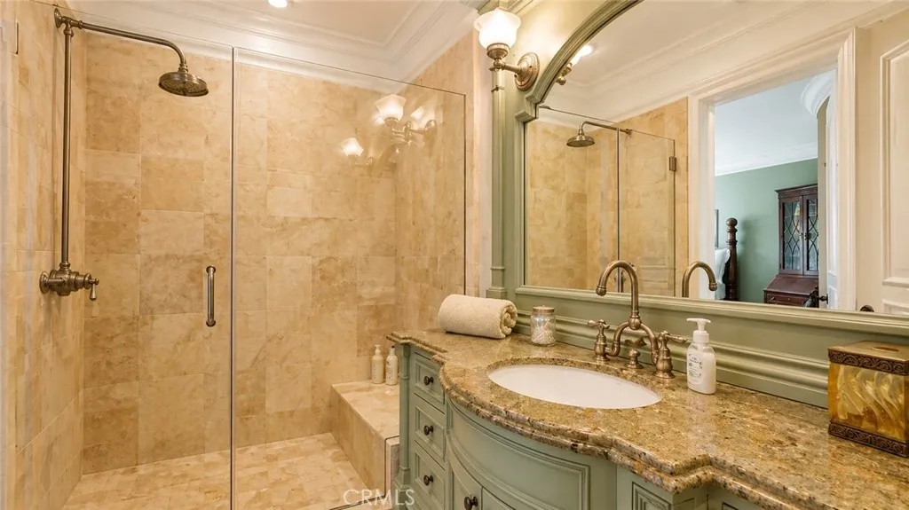 Guest Bath in Bedroom 4 with stone shower.
