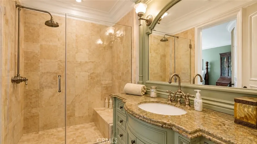 Guest Bath in Bedroom 4 with stone shower.