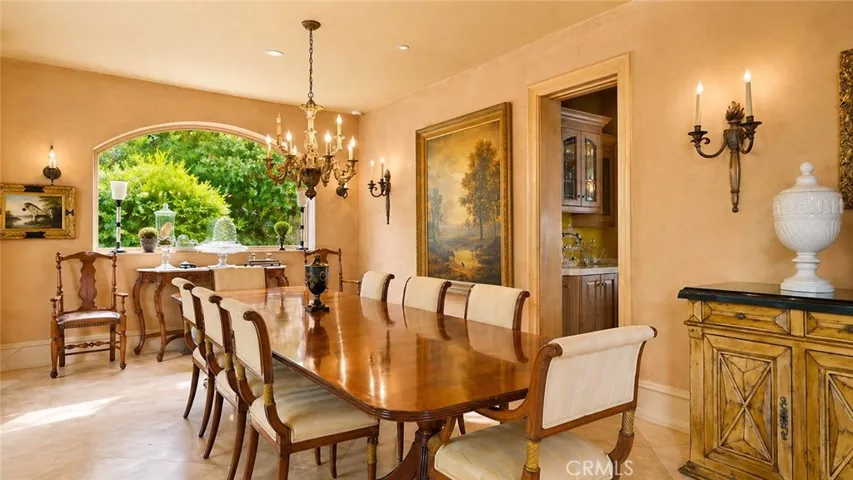 Dining Room with hand troweled smooth coat plaster walls.