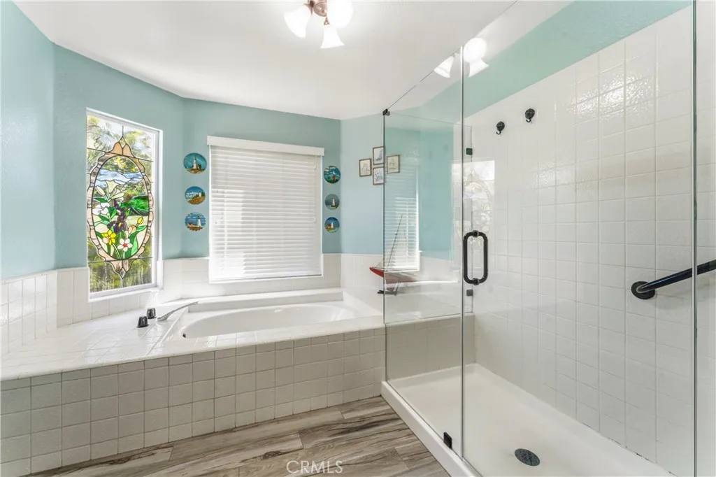 Primary Bathroom Low Entry Shower and Roman Tub