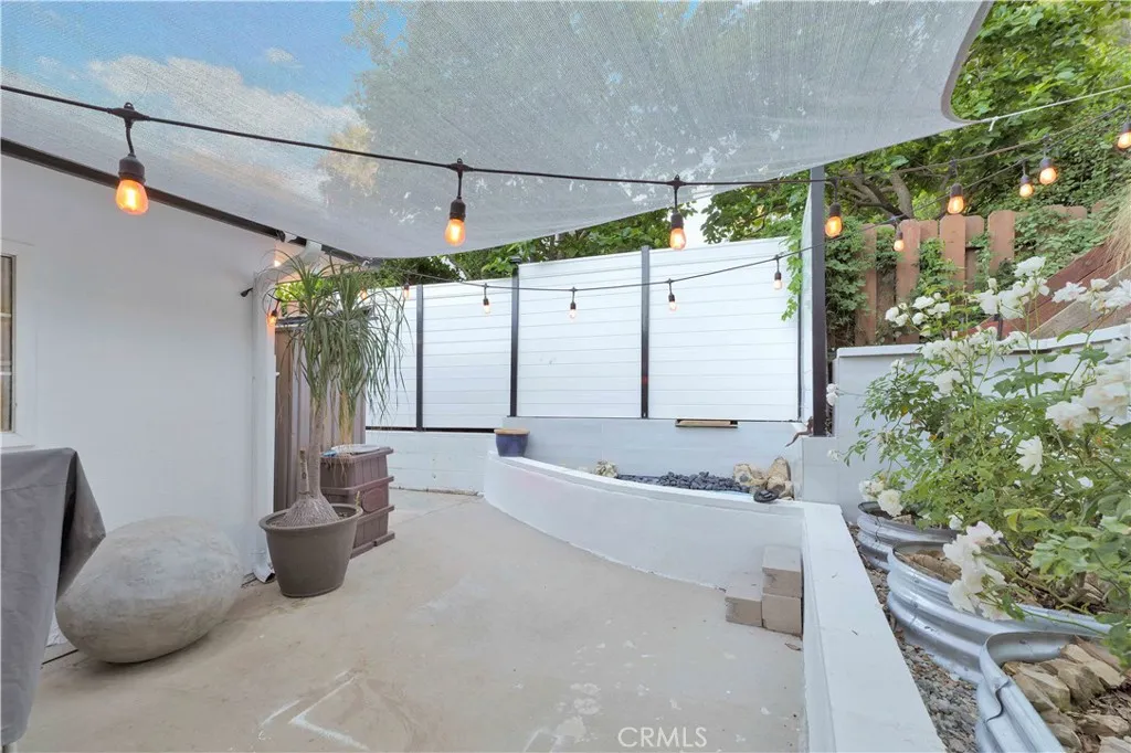 Private backyard gathering space at 4772 Excelente Drive.