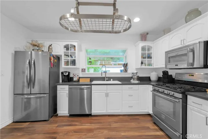 Updated kitchen at 4772 Excelente Drive with stainless steel appliances.