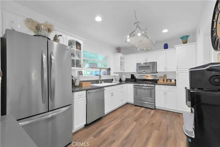 Updated kitchen at 4772 Excelente Drive with stainless steel appliances.