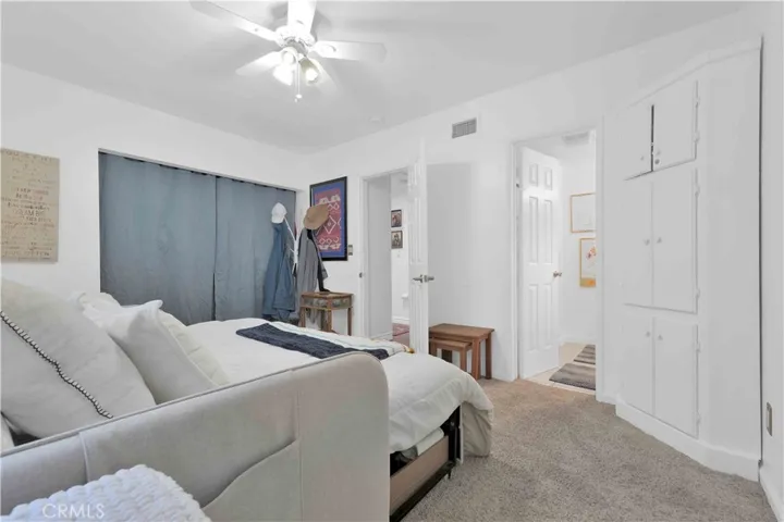 Third bedroom at 4772 Excelente Drive shown in its existing layout with a large window.