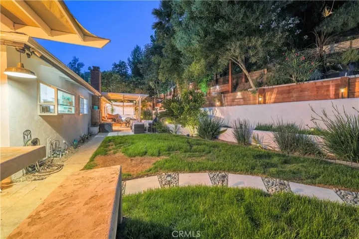 Private backyard gathering space at 4772 Excelente Drive.