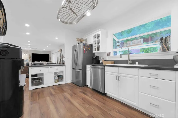 Updated kitchen at 4772 Excelente Drive with stainless steel appliances.