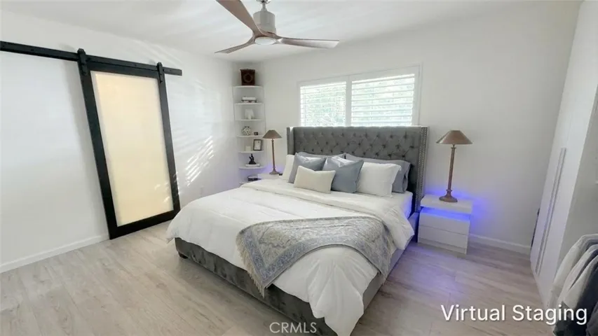 Virtually staged alternative layout for primary bedroom at 4772 Excelente Drive, showcasing modern decor concepts.