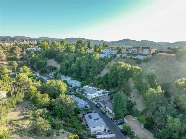 Drone aerial view of 4772 Excelente Drive and surrounding neighborhood.