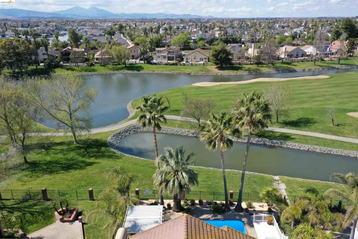 Expansive golf course and water feature views