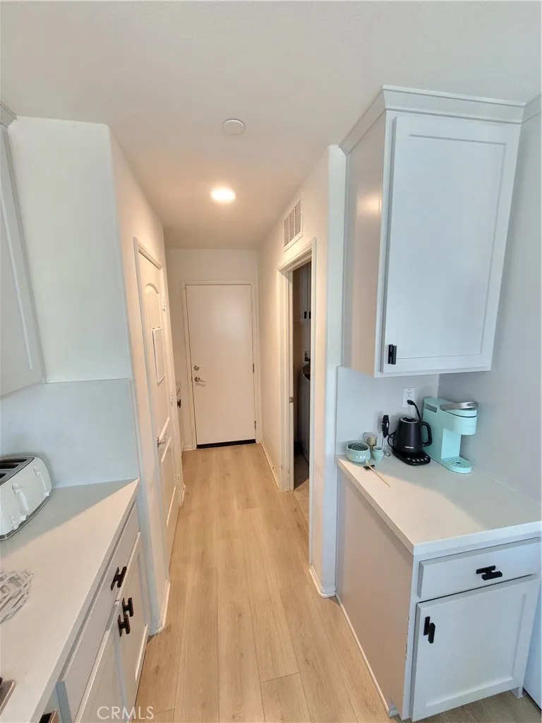 Laundry room and garage access off kitchen