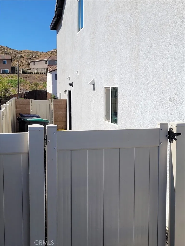 possible area for trash cans or pet area