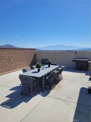 rear yard dining space near sliding door.