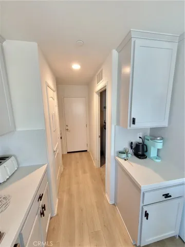 Laundry room and garage access off kitchen