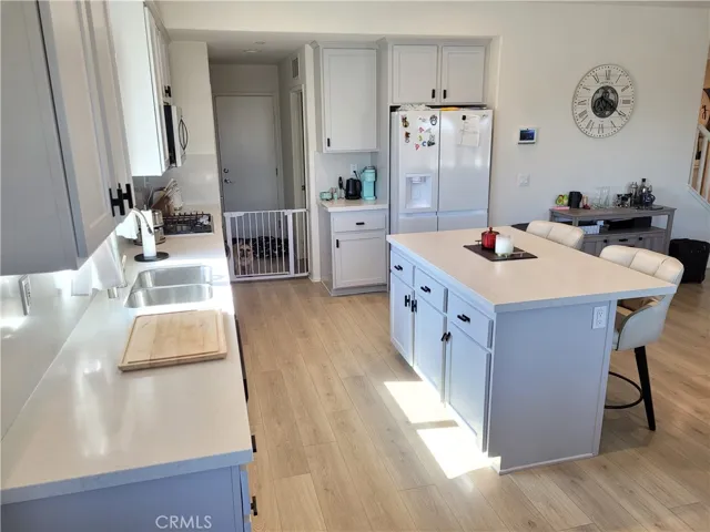 Kitchen second view with eat at counter