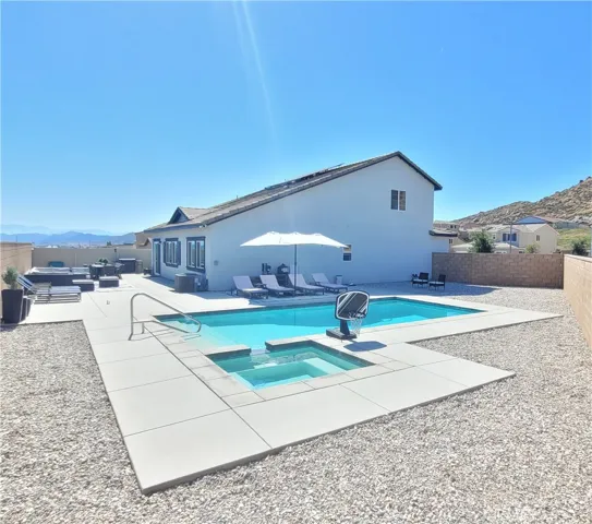 rear yard pool and spa, west to east view