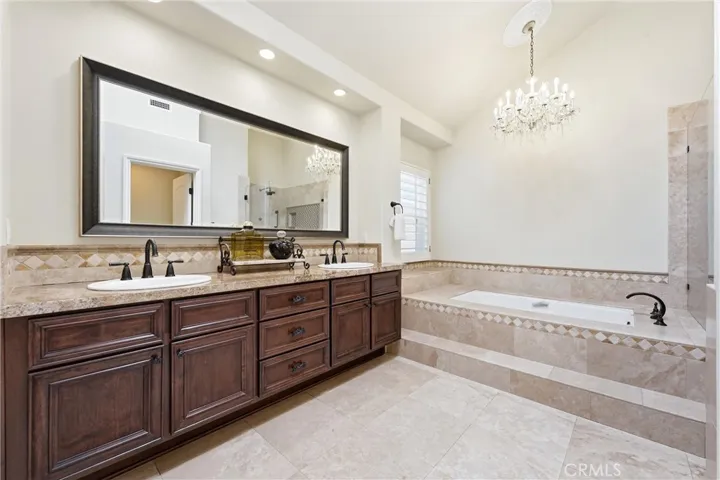 Primar Bath with Dual Sinks and Soaking Tub.