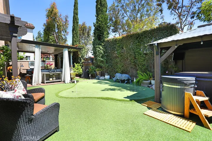 Putting Green in Lush Private Backyard.