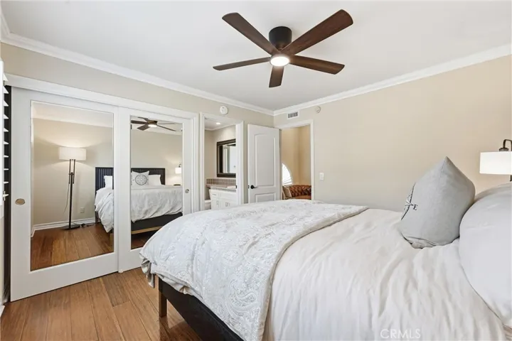 Custom Closet Doors, Designer Fan, Private Bathroom.