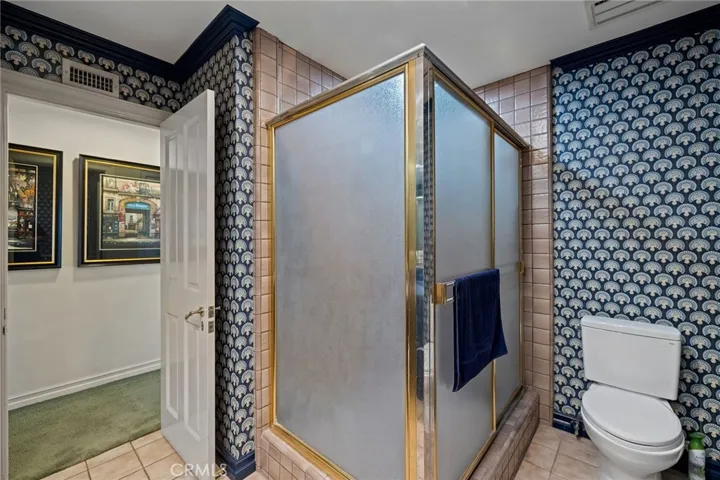 Upstairs bathroom with a large walk-in shower.