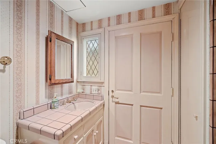 Downstairs 3/4 bath with walk-in shower.
