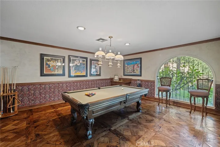 Large game room with Venetian plaster walls and fabric wall covering!