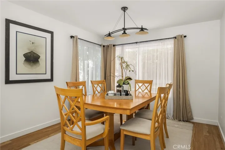 Your view from the dining room looks out onto fruit trees.