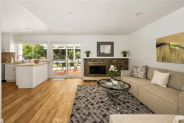 Kitchen is open to the family room and loely bakyard.
