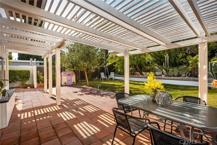 Just off the kitchen is an expansize patio.