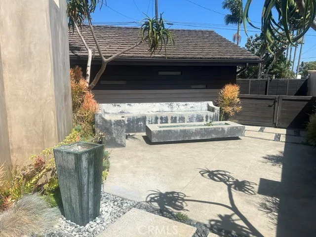 Outdoor Entertaining Concrete Bench Seating with Fountain, Custom Fire Table