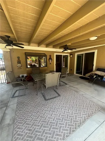 great patio area. with ceiling fans.