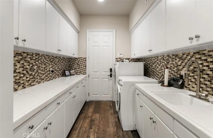 Laundry with sink and ample storage