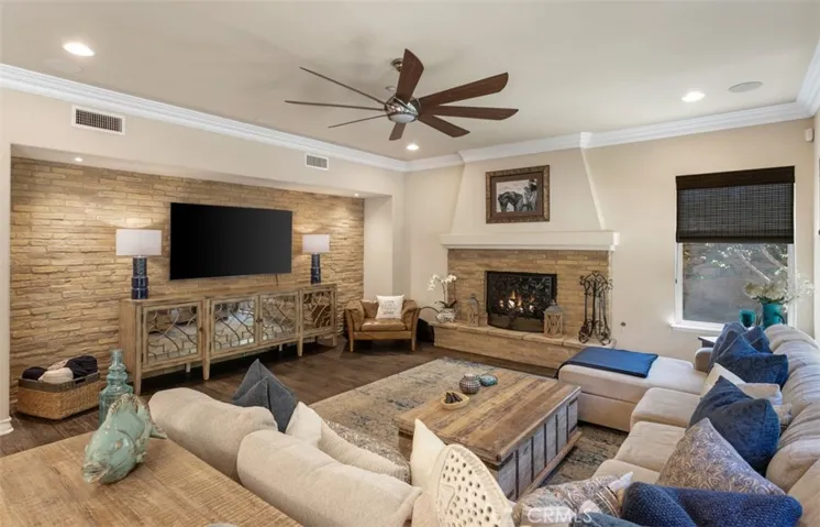 Family room with fireplace and beverage station