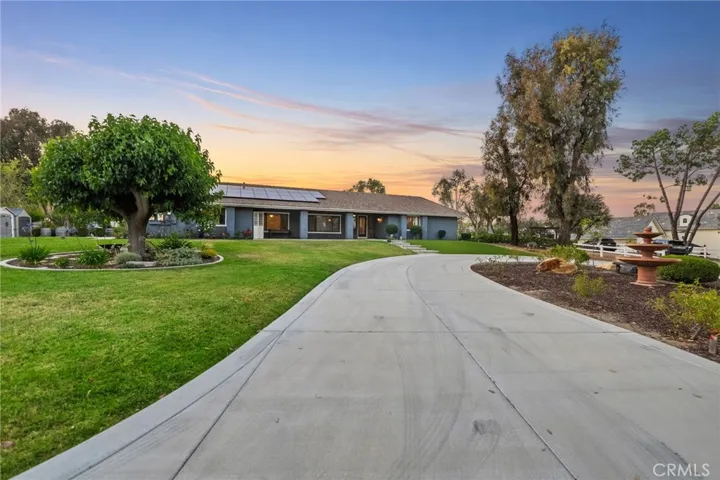 start of circular driveway to home