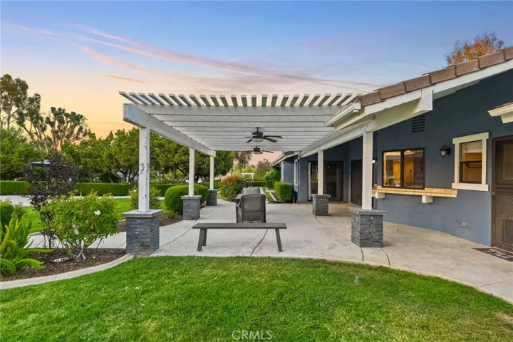 covered patio, grassy area backyard