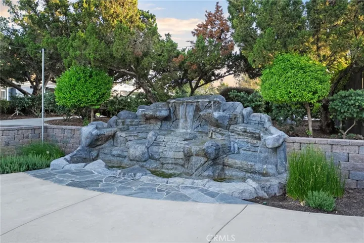 beautiful waterfall near dance floor and lower part of backyard. wonderful entertainment area