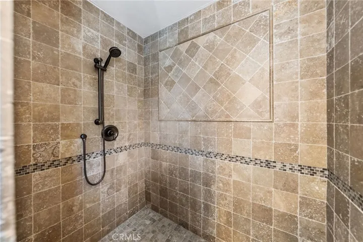 primary bathroom walk in custom tile shower