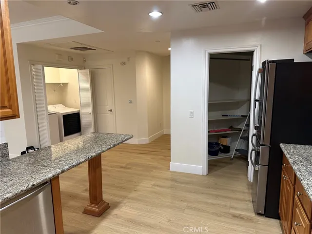 View of the kitchen to the pantry room