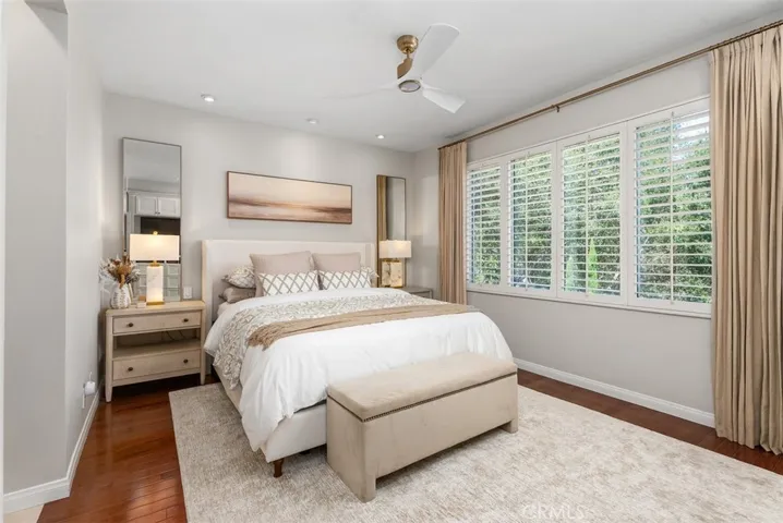 The primary bedroom offers pleasant views.