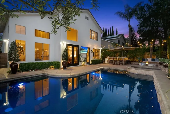Inviting backyard for gatherings and leisure. (TV is virtually enhanced)