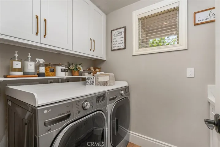 Convenient downstairs laundry room.