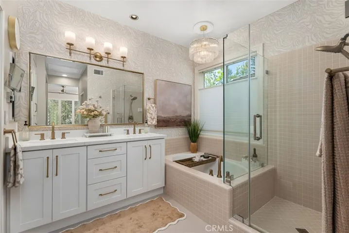 Clean and bright primary bathroom.