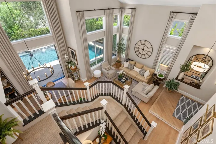 A dramatic and inviting view of the expansive open living room.