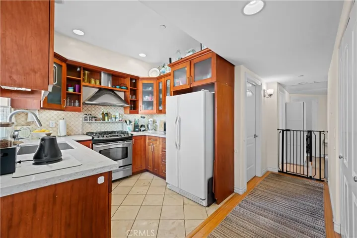 Kitchen looking down main hallway tenant's furnishings-vacant​​‌​​​​‌​​‌‌​​‌​​​‌‌​​​‌​​‌‌​​‌‌​​‌‌​​​​ now