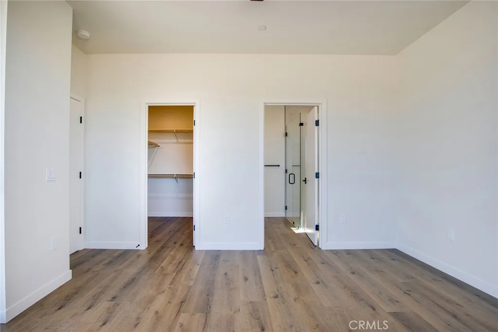 MASTER BEDROOM WITH WALK-IN CLOSET AND WALK IN SHOWER!
