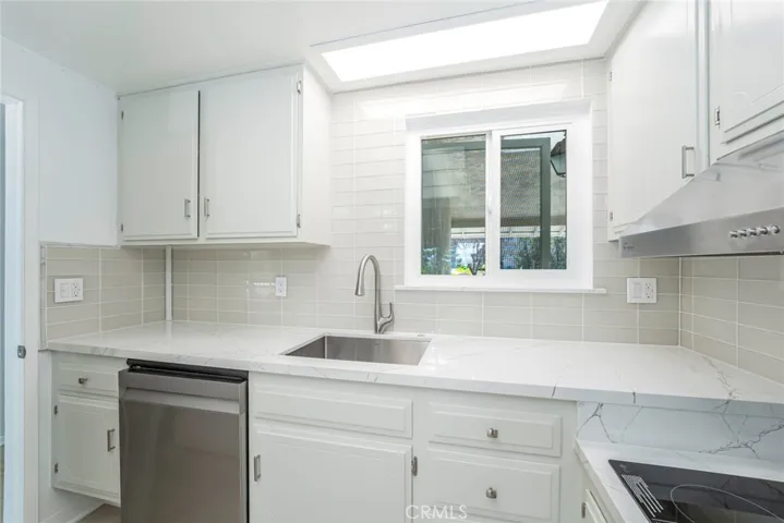 Stainless sink and bright for food preparation!